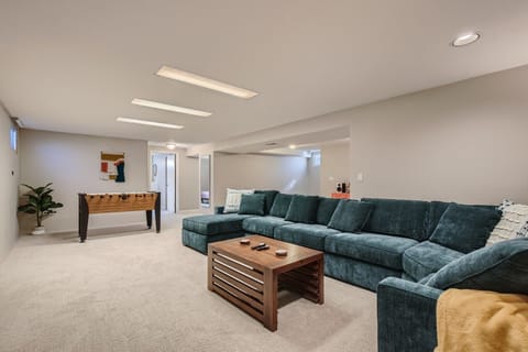 Basement includes Large Screen TV, Record Player, and Foosball Table