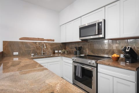 Kitchen: a full set of cookware and dining essentials for all your needs.