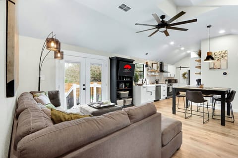 View from the living room looking back toward the dining area and kitchen.