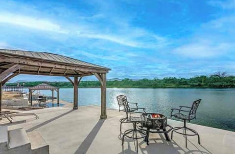 Lakeside Covered Patio with Fire Pit and seating
