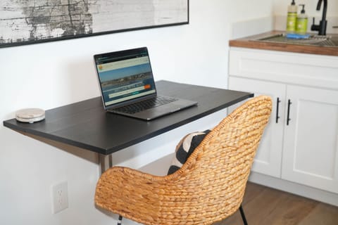 This  workspace perfect for anyone looking for place to work during their stay, and it also doubles as a dining table!