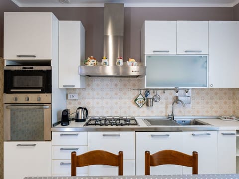 Blue, Chair, Outdoor Furniture, Design, Shade, Outdoor Table, Eco Hotel, Patio, Houseplant, Daylighting