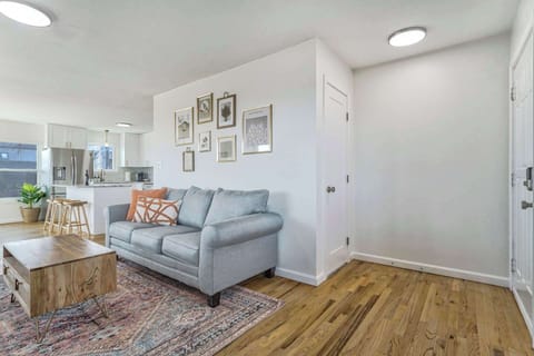 Our Living Room Offers Ample Space, an Inviting Sofa, Beautiful Lighting, and an Atmosphere That's Simply Amazing.