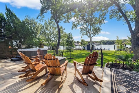 Relax lakeside in style - enjoy the view from your private hot tub and huge deck