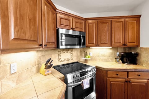 Open living, dining and kitchen area. Fully stocked kitchen. 