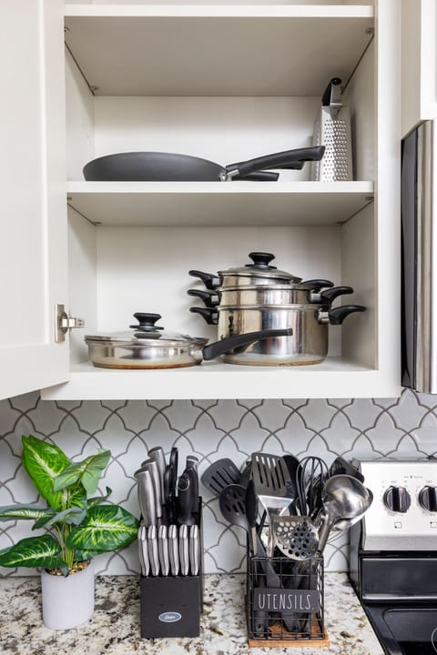 Fully equipped kitchen with pots, pans, cutlery, and cooking utensils — making your extended stay or weekend escape feel just like home.