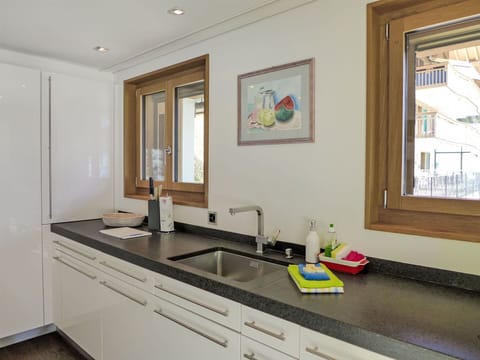 Countertop, Kitchen, Interior Design, Kitchen Sink, Wood, Plumbing Fixture, Cabinetry, Flooring, Home, Sink