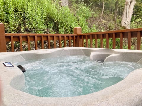 Come unwind in the private 4 person hot tub located on the back of the deck.