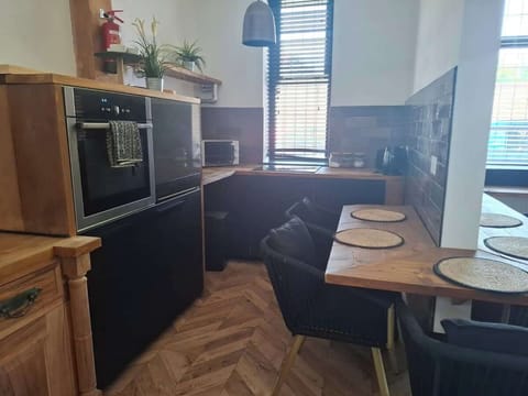 Kitchen and Wrap around Dining/Working Area