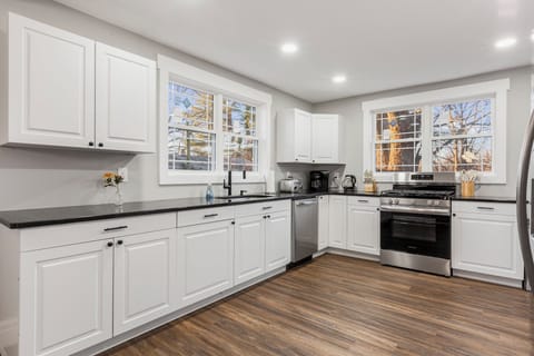 Outfitted with sleek stainless steel appliances and elegant granite countertops, our kitchen is perfect for whipping up and enjoying meals with your favorite people! Brew your morning cup with the convenient coffee maker and enjoy the fully stocked essentials ready for your culinary adventures. The kitchen seamlessly flows into the dining and living areas, making it perfect fo...