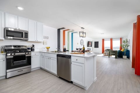 Fully equipped kitchen with brand new stainless steel appliances. 