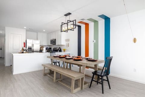 The Dining area has a large table and benches to accommodate 10 guests. We also provide a Chicco easy clean high chair for our littlest guests.