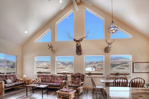 Living room - The larger windows highlight the Creede Cliffs and surrounding mountains.