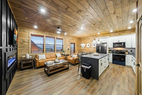 Spacious, stylish, and cozy. This open-concept cabin blends modern design with rustic warmth, featuring a fully equipped kitchen and a comfy living area for the perfect stay