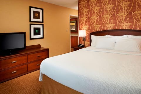 Relax with in-room entertainment and a perfectly made bed.