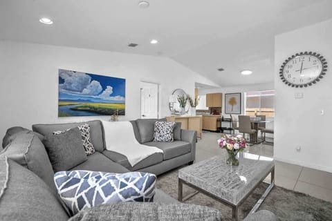 Make yourself at home in the cozy living room—watch your favorite TV shows or simply lounge on the comfortable sofa.