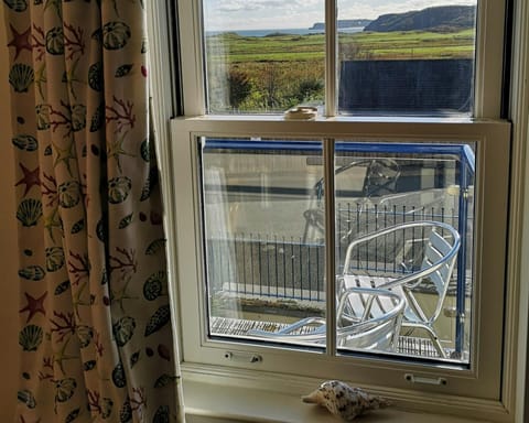 view from the window of penally beach