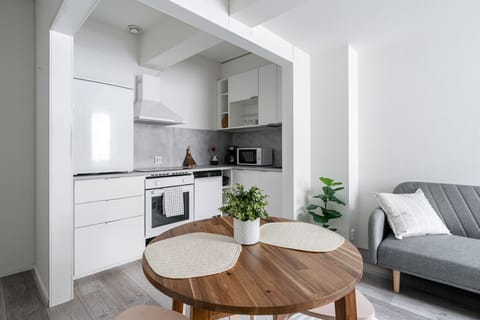 Apartment living room, dininf area and kitchen