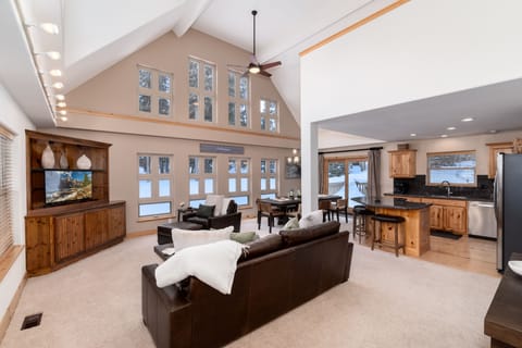 Beautiful Open 2 Story Living Room, Dining Room and Kitchen Area!