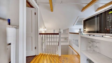 Features a mini-fridge, microwave, and coffee pot...