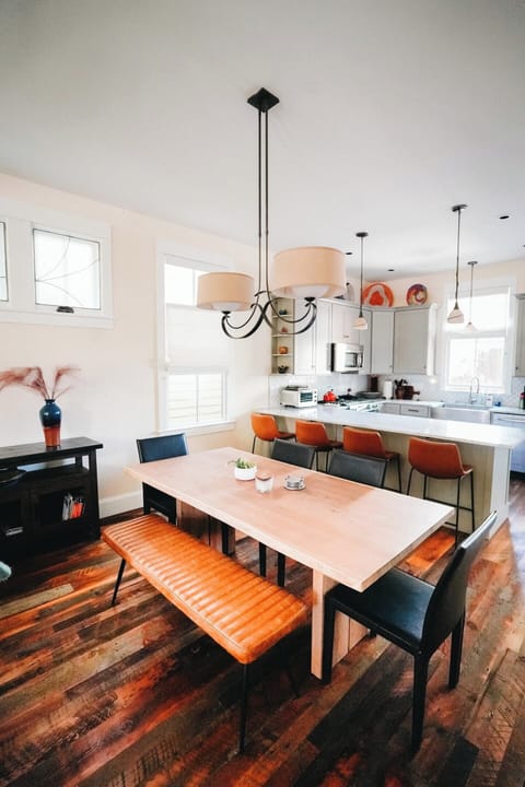 Dining table and kitchen bar. Table can seat 7 and bar can seat 4. Outside dining has another 6 chairs. 