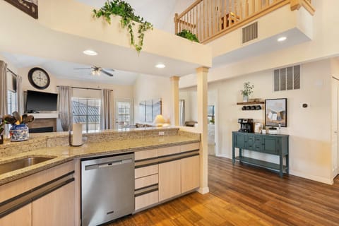 The inviting kitchen offers ample storage & every home comfort