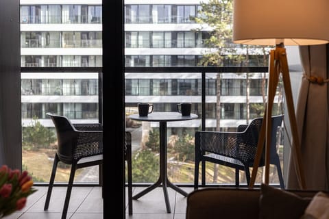 A spacious terrace with a cozy spot for morning coffee and relaxation to the soothing sound of the waves. A perfect oasis of tranquility.