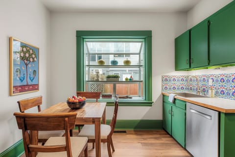 Extra dining table comfortably sits four.