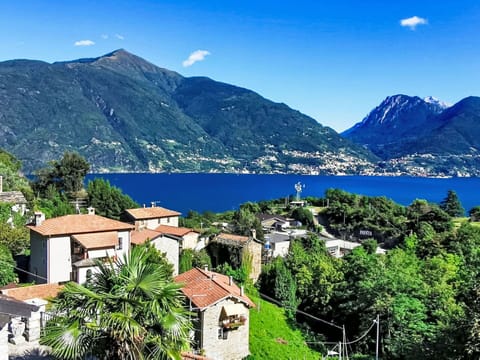 Blue, Mountainous Landforms, Mountain, Hill, Coast, Mountain Range, Highland, Hill Station, Coastal And Oceanic Landforms, Human Settlement