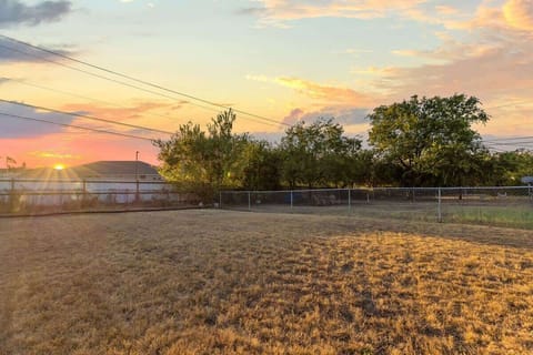 Outdoor Oasis: Enjoy stunning sunset views in your spacious private yard—perfect for gatherings!