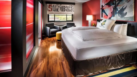 Unit with 1 King bed. Exact unit will be assigned upon arrival. Views, colors, and decor may vary.