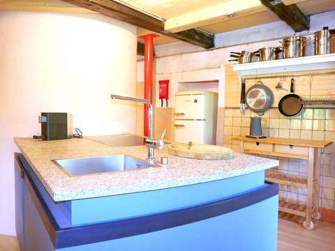 Kitchen, Countertop, Wood, Interior Design, Flooring, Plumbing Fixture, Ceiling, Sink, Floor, Lighting