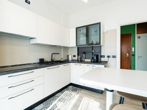 Kitchen, Countertop, Kitchen Appliance, Interior Design, Flooring, Major Appliance, Furniture, Cabinetry, Wood, Floor