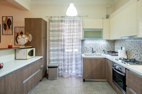 Spacious and fully equipped kitchen with all necessary amenities