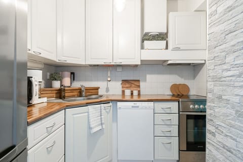 Apartment private kitchen with a dishwasher