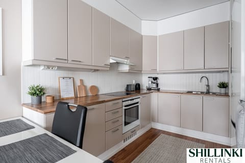 The kitchen is well equipped with cooking ware.