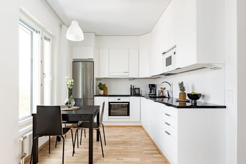 The kitchen is well equipped with cooking ware.