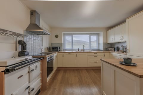 Spacious kitchen with stove, oven, m'wave, range, fridge/freezer and dishwasher.