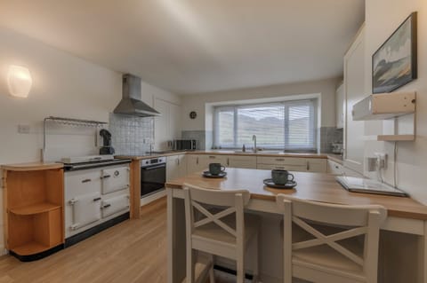 Spacious kitchen with stove, oven, m'wave, range, fridge/freezer and dishwasher.