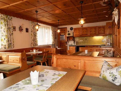 Furniture, Wood, Interior Design, Table, Ceiling, Room, Light Fixture, Chair, Hardwood, Wood Stain