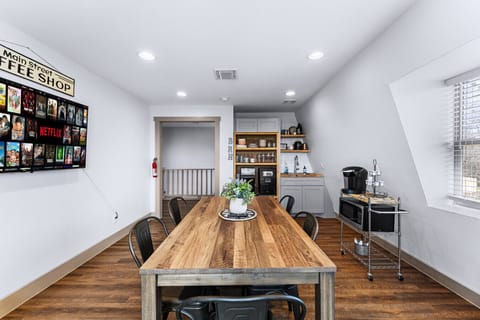 Upstairs shared dining area with ice machine and coffee station