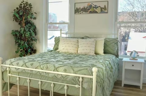 spacious bedroom with Queen size bed