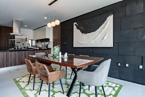 Dining area with vibrant seating and an elegant design for gathering