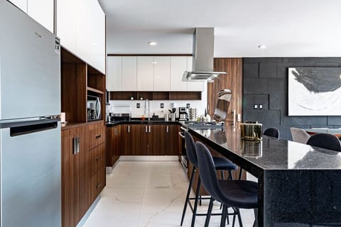 Stylish and modern kitchen with high-end finishes and efficient layout