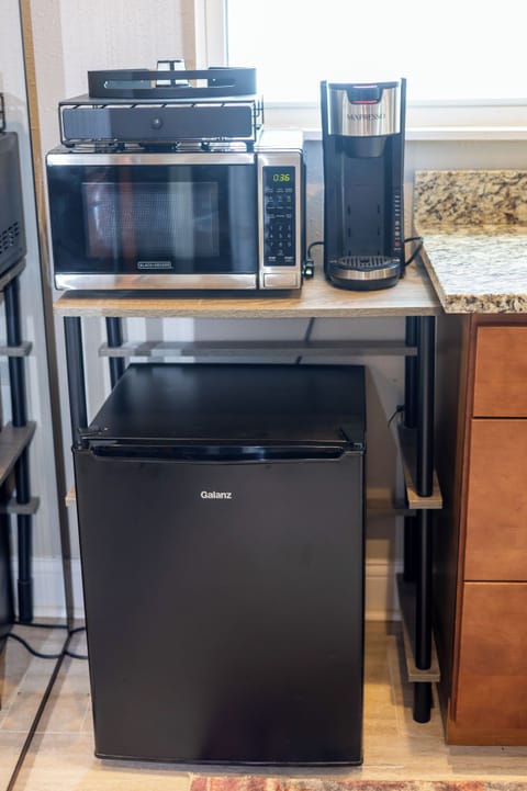 Private mini kitchen set in the primary bedroom