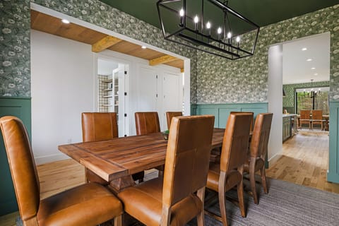 Dine in style in our sophisticated dining area, one of two available, featuring elegant décor and seating for 8. Perfect for memorable group meals, celebrations, or intimate gatherings in a luxurious and inviting setting.