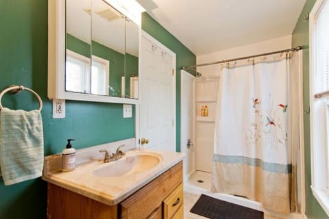 Upstairs bathroom with a walk in shower