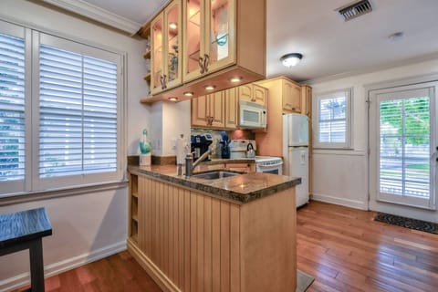 With plenty of counter space, the kitchen makes meal prep easy and convenient, allowing you to cook with ease and comfort.