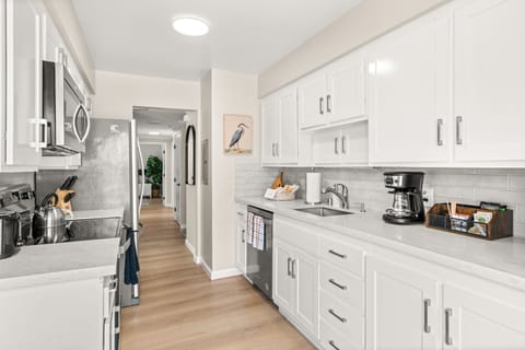 Whip up beachside snacks or family dinners in the fully equipped kitchen with all the essentials that you need.