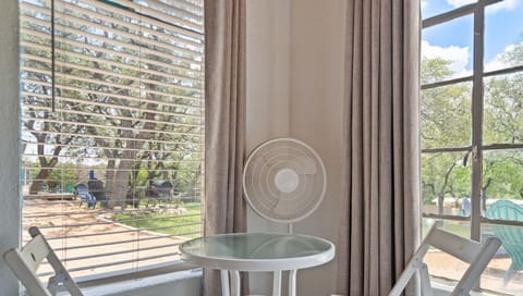 Unwind here! Enjoy the view from this bright and cozy spot.